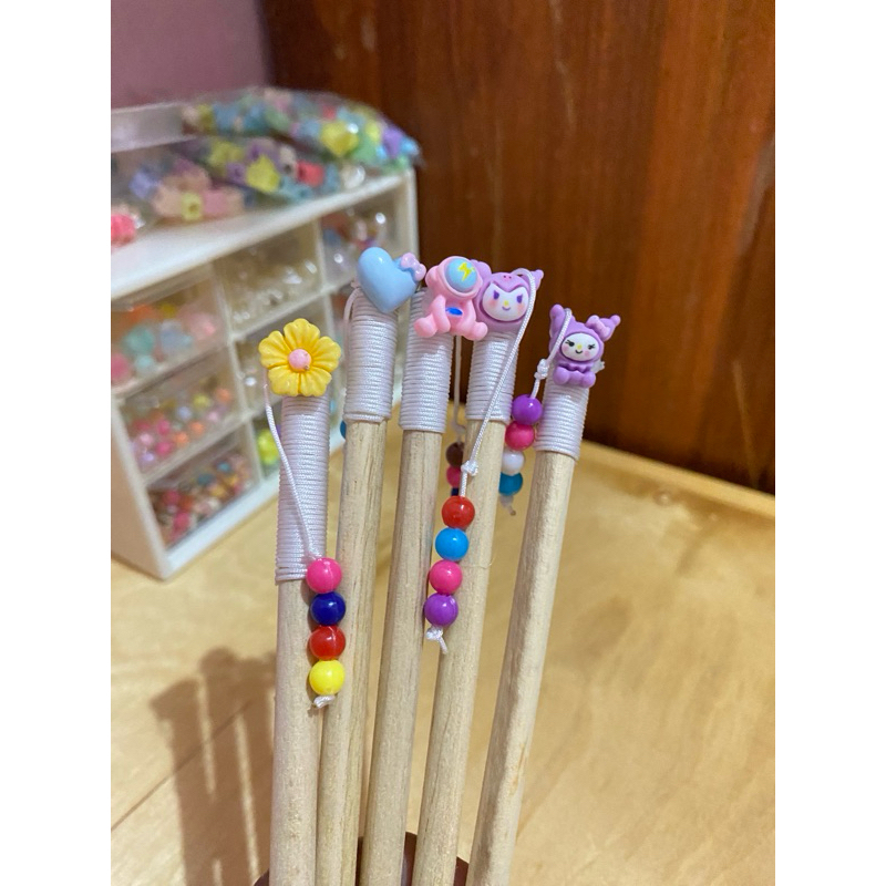 

Pensil hias random
