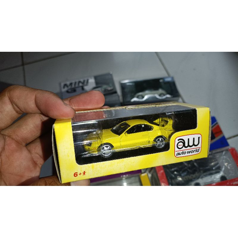 auto world - Toyota Supra yellow