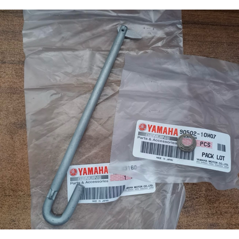 Tilt Rod assy + spring Yamaha 15-25pk