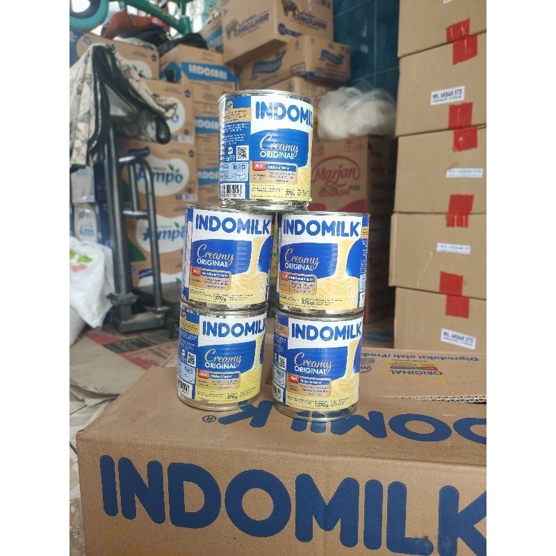 

Indomilk kaleng 370g