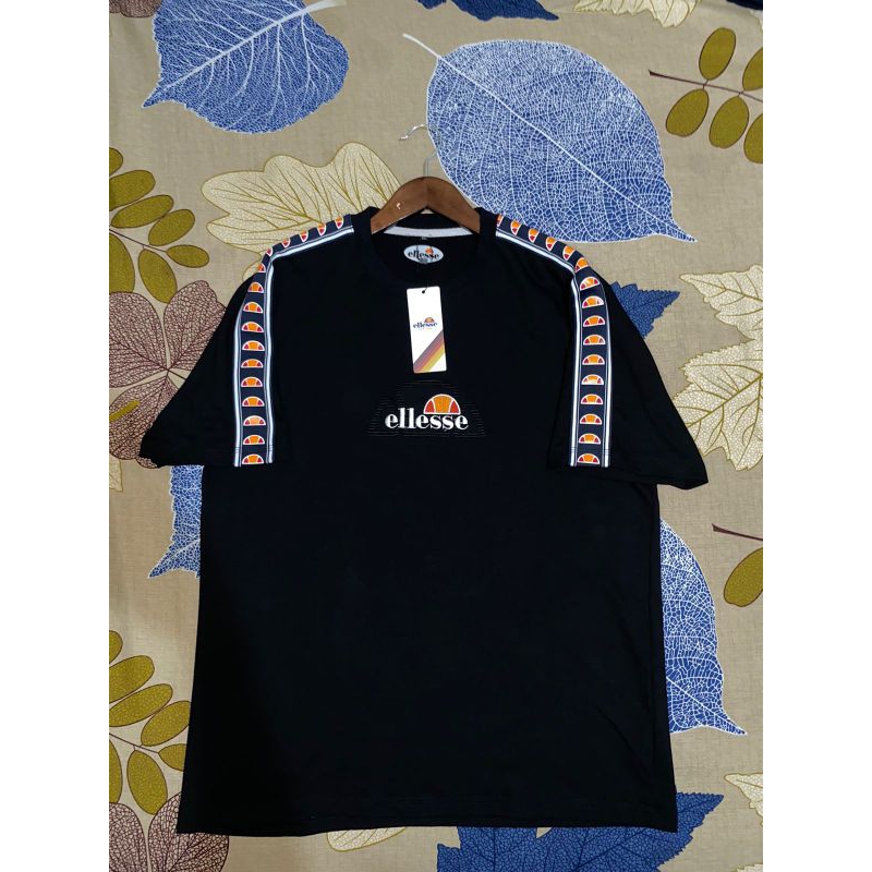 kaos Ellesse tapet import