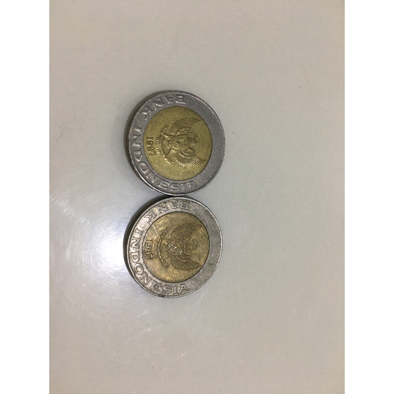 Koin pecahan logam 1000 kelapa sawit tahun 1997