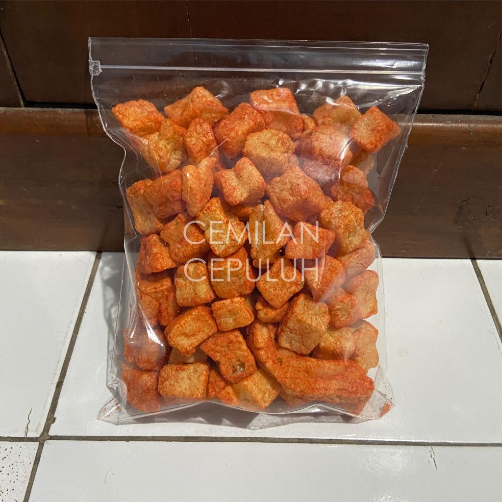 

KERUPUK TAHU PEDAS (TIDAK TERLALU PEDAS) 150 Gram