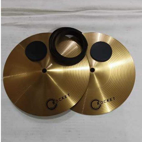 Simbal / Cymbal drumband 10 inci (1 pasang + pegangannya). Merk Dluxe/Rocket.