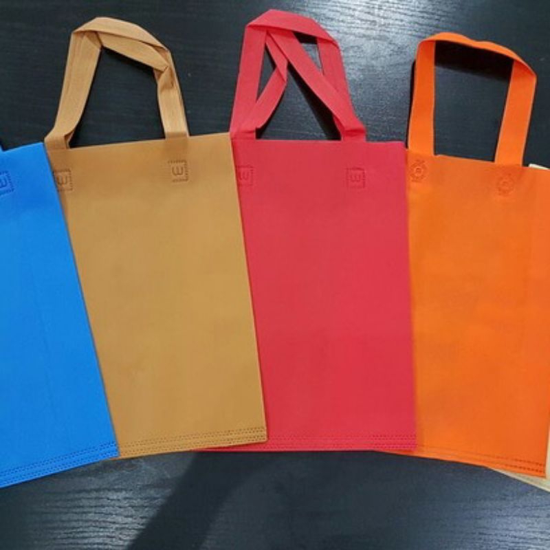 

tas kain spunbond lipat samping bahan tebal isi 12 pcs (38*10*45)