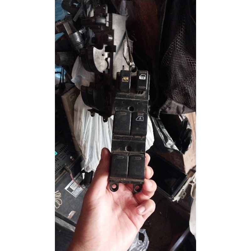 tombol power window grand livina