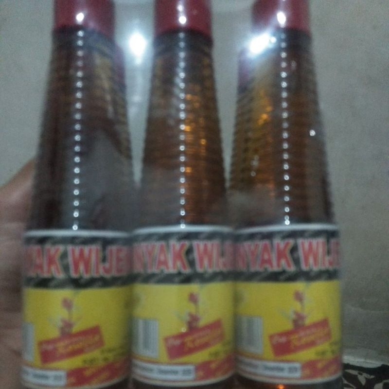 

Minyak Wijen cap " Bunga Rosella
