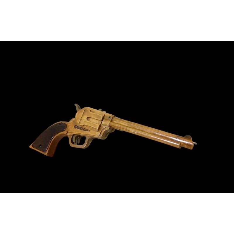 single action "Peacemaker" rubber band gun