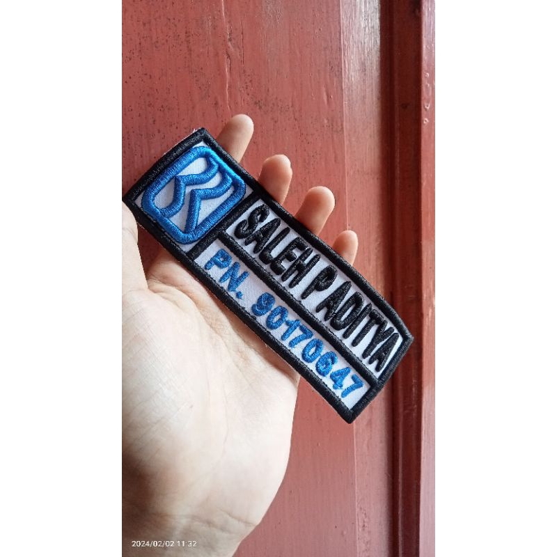 BORDIR NAMA SATPAM BRI TIMBUL ADA LOGO DINAMANYA