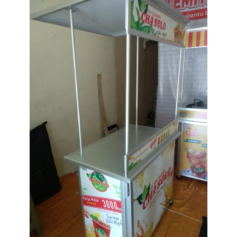 Booth Portable Meja Lipat Rombong ukuran 100x60 dilengkapi Atap Datar untuk jualam Es Teh dan Jajana