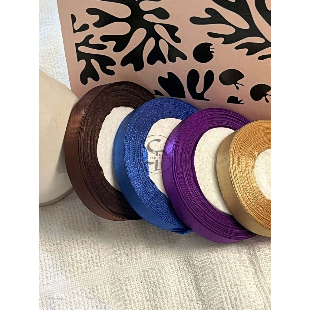 

PITA SATIN 1,5 CM PER ROLL 20 YARD BERBAGAI WARNA