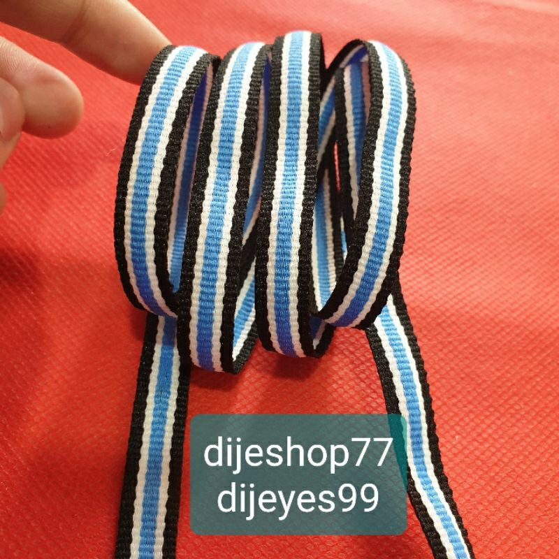 

pita kain list biru hitam 1 cm / pita list per meter / pita bisban / pita motif 2 sisi / pita hias / pita dekorasi / pita list kerah/ webbing