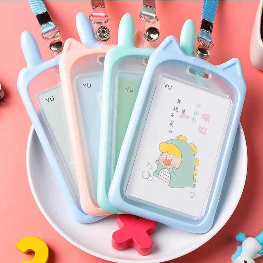 

OKESTORE_PKU / COD / Name Tag Lanyard / Gantungan Kartu Motif Kuping / Id Card Holder Akses MRT / Busway / E-Money / Kantor / Bentuk Karakter / Warna Pastel / Biru / Pink / Ungu / Toska / Abu / Leher / PEKANBARU