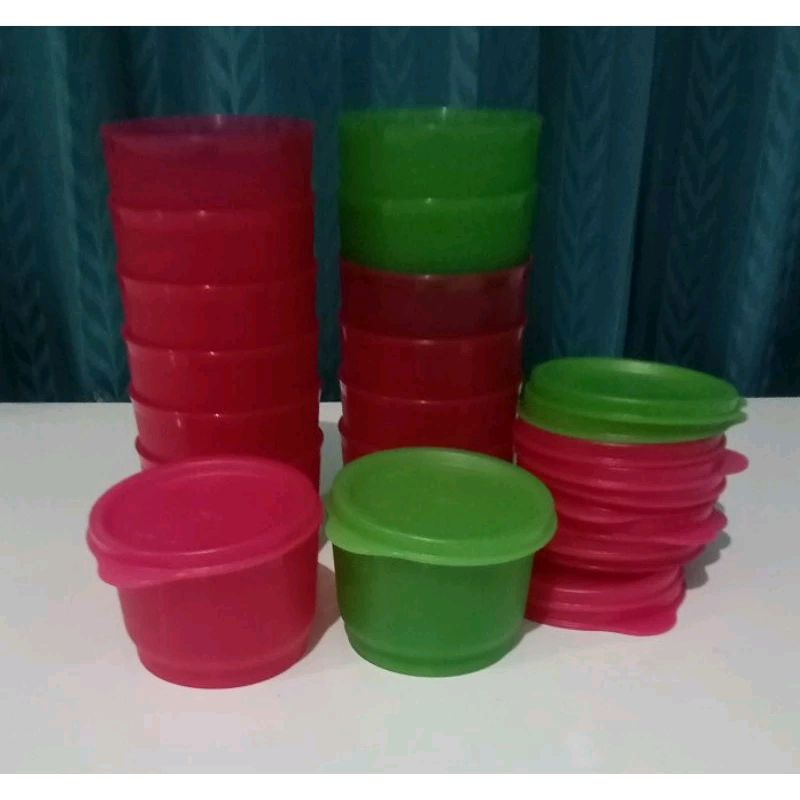 

Snack cup Tupperware 125ml. cocok untuk sambel ,tempat puding barang baru 1 pcs