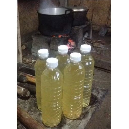 

Minyak Kelapa Tandusan Asli Bali 100%, Lengis Nyuh Tandusan Asli 600ml, Rahasia Kelezatan Masakan Bali.