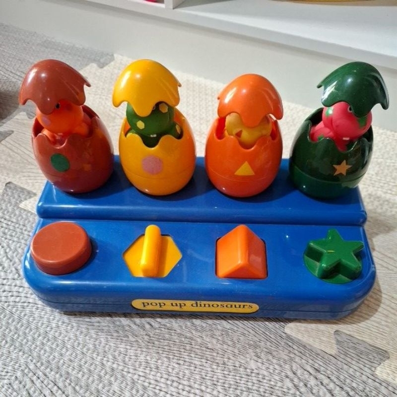 Mainan Pop Up dinosaurus brand Tolo