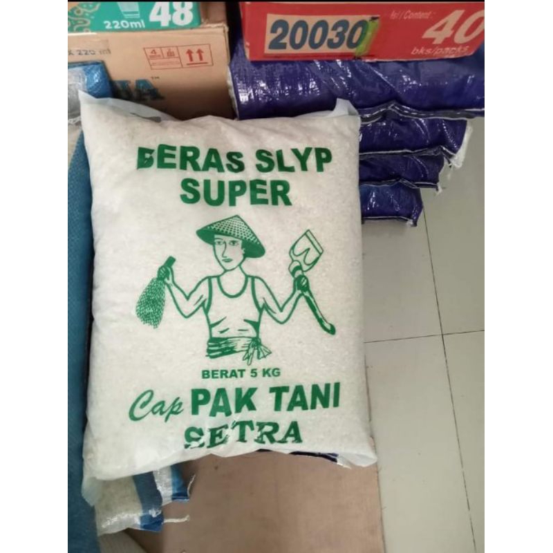 

Beras pak tani,netto 5kg