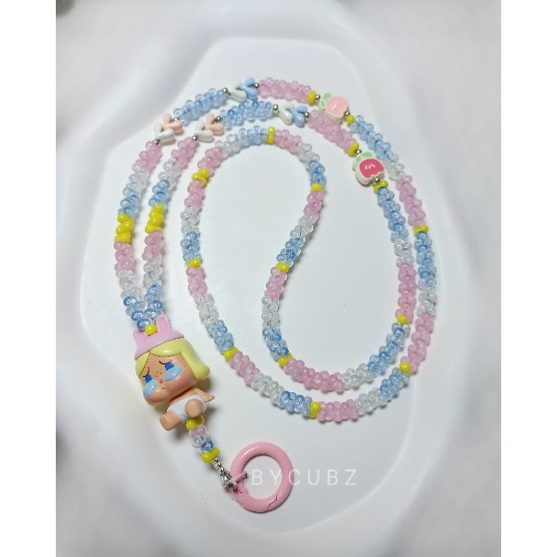 

READY LANYARD CRY BABY ORIGINAL POPMART WITH PEANUT GLOW IN THE DARK AND ALLOY BEADS