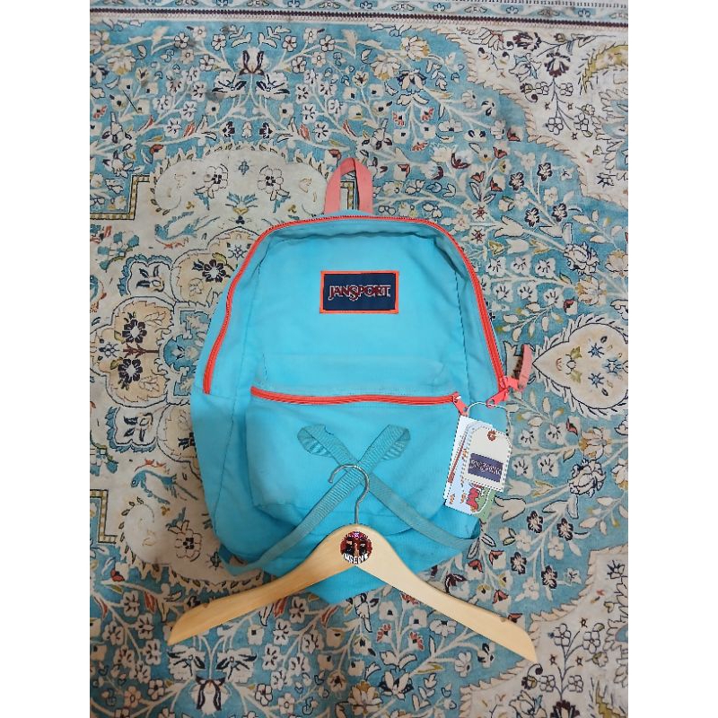 tas jansport biru muda