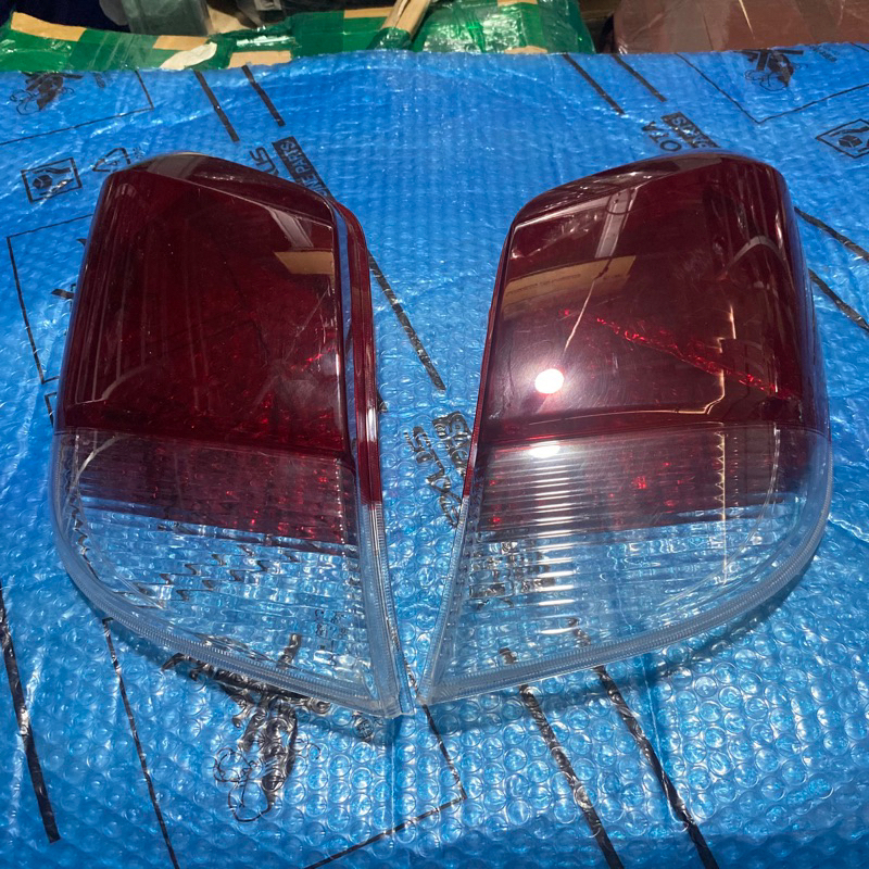 mika lampu belakang agya ayla original baru