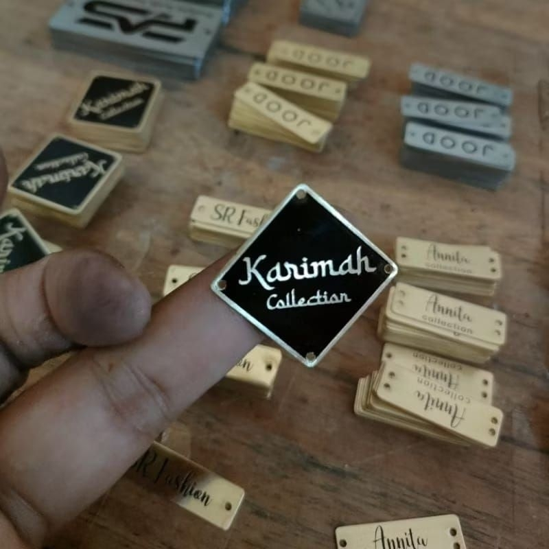 

Label plat pakaian baju hijab