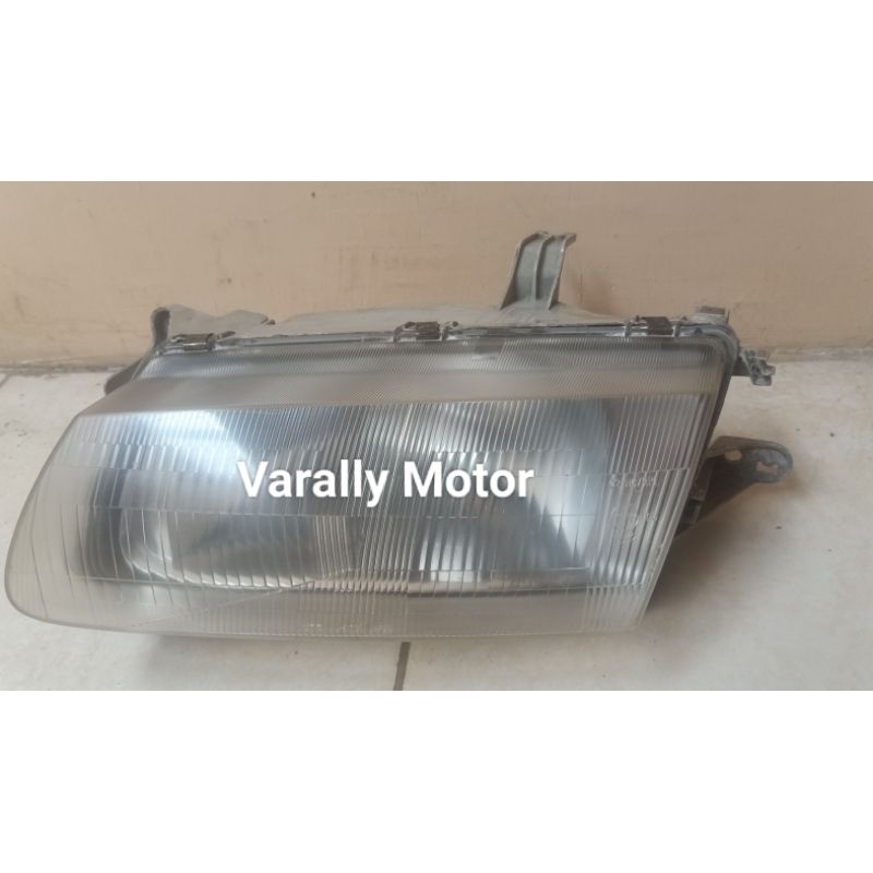 Head Lamp-Lampu Depan Kiri(LH) Original Mazda 323 Lantis (Th 94-96)