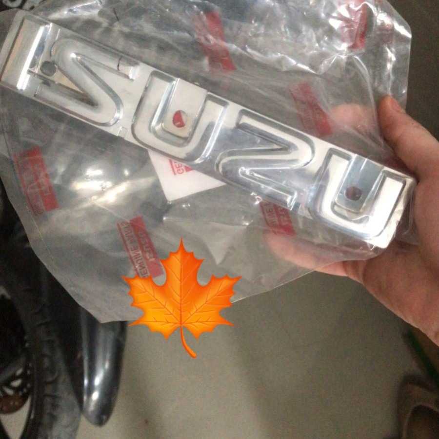 EMBLEM ISUZU GRILL DEPAN ISUZU PANTHER CAPSUL