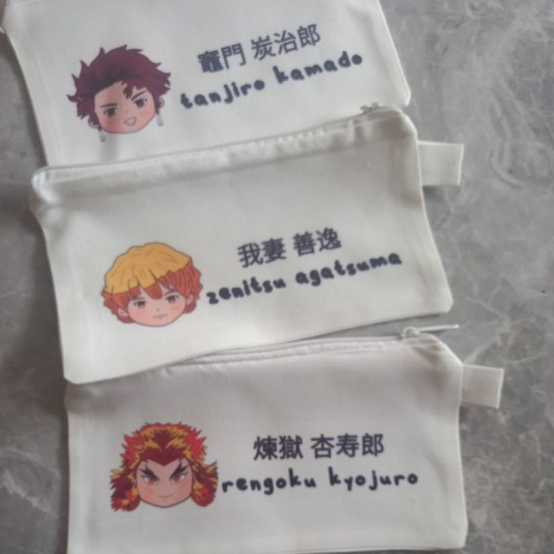 

Tempat pinsil / mini pounch anime kimetsu no yaiba demon slayer tepak tanjiro kamado zenitsu rengoku