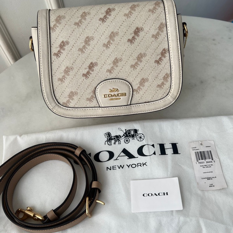 coach saddle bag butik authentic