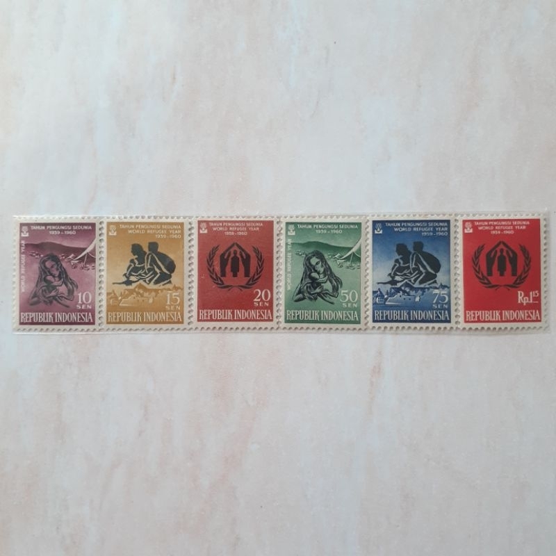 

(A) Perangko Indonesia Tahun Pengungsi Sedunia Tahun 1960 set lengkap 6pcs