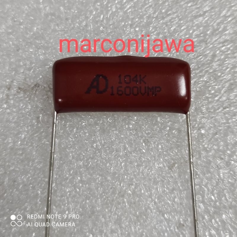 Capasitor milar 104K 1600 AD asli japan