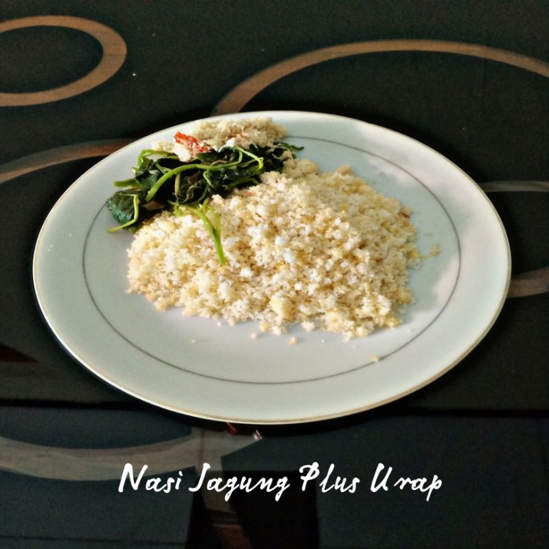 

Nasi Jagung Mateng toping parutan kelapa