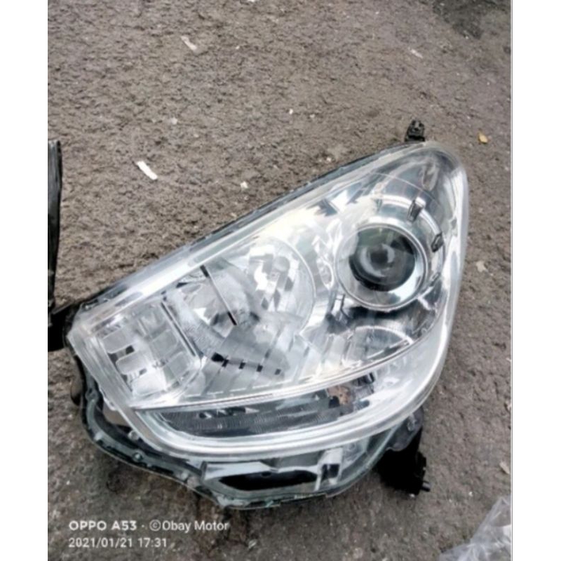 headlamp Daihatsu sirion 2012