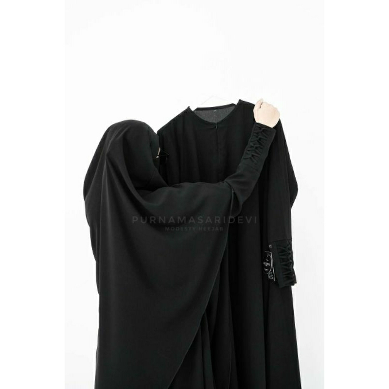 TWIST DRESS BY PURNAMASARIDEVI