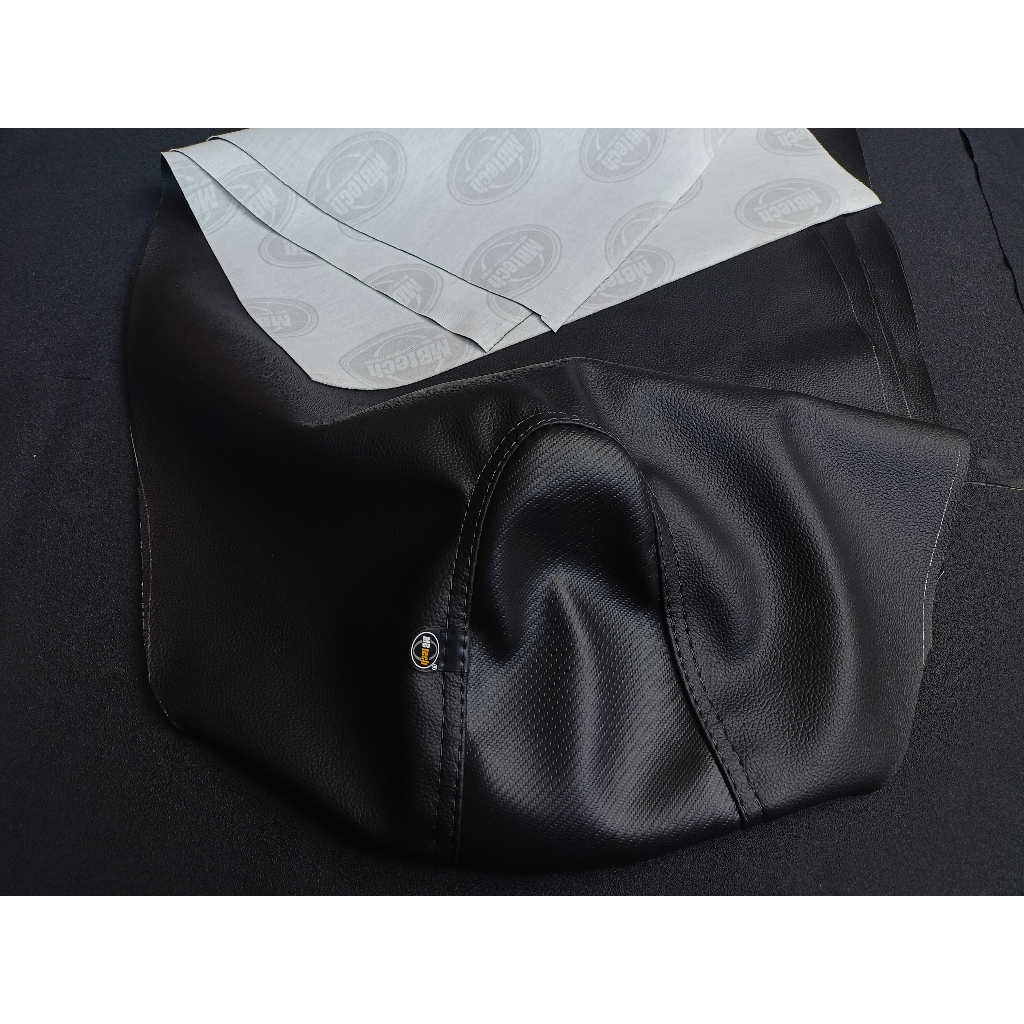 COVER KULIT SARUNG JOK SUPRA X 125 KARBU MBTECH - KULIT JOK SUPRA X 125 KARBU MBTECH