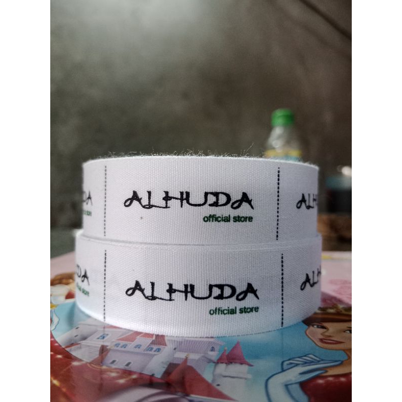 

Label hijab katun woven damask subtitute