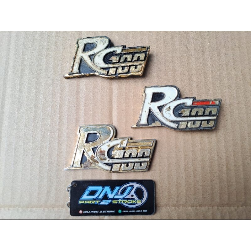 logo emblem sayap rc100 original