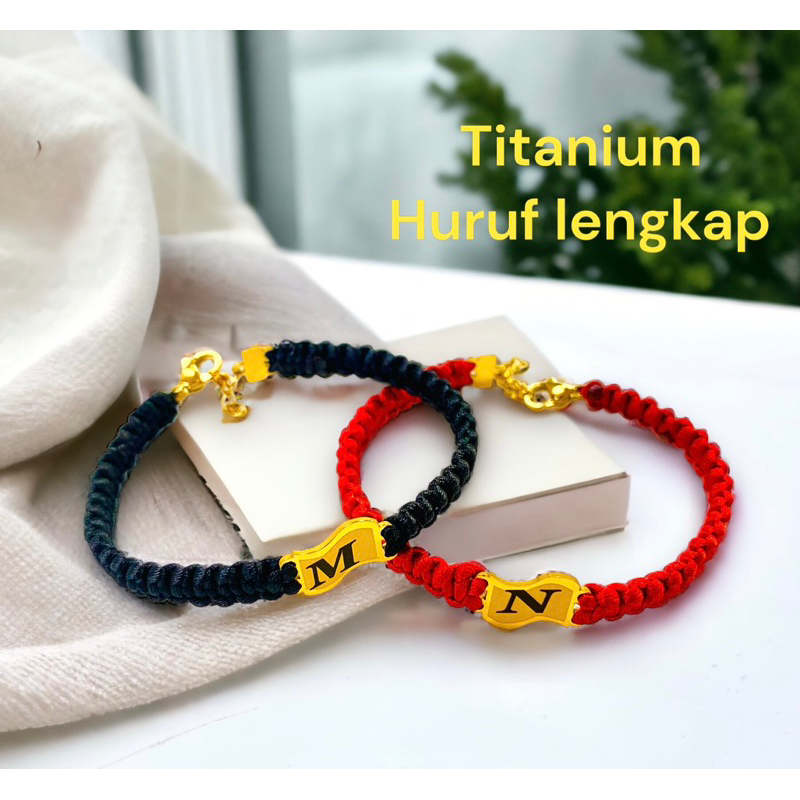 gelang huruf titanium asli