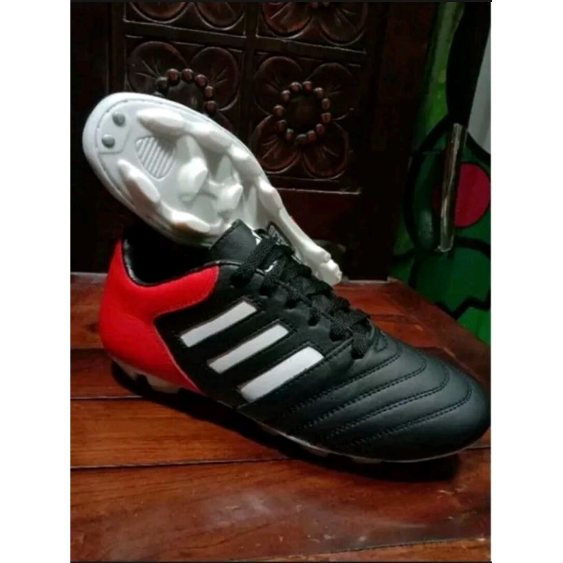 sepatu bola 100 % kulit sapi asli