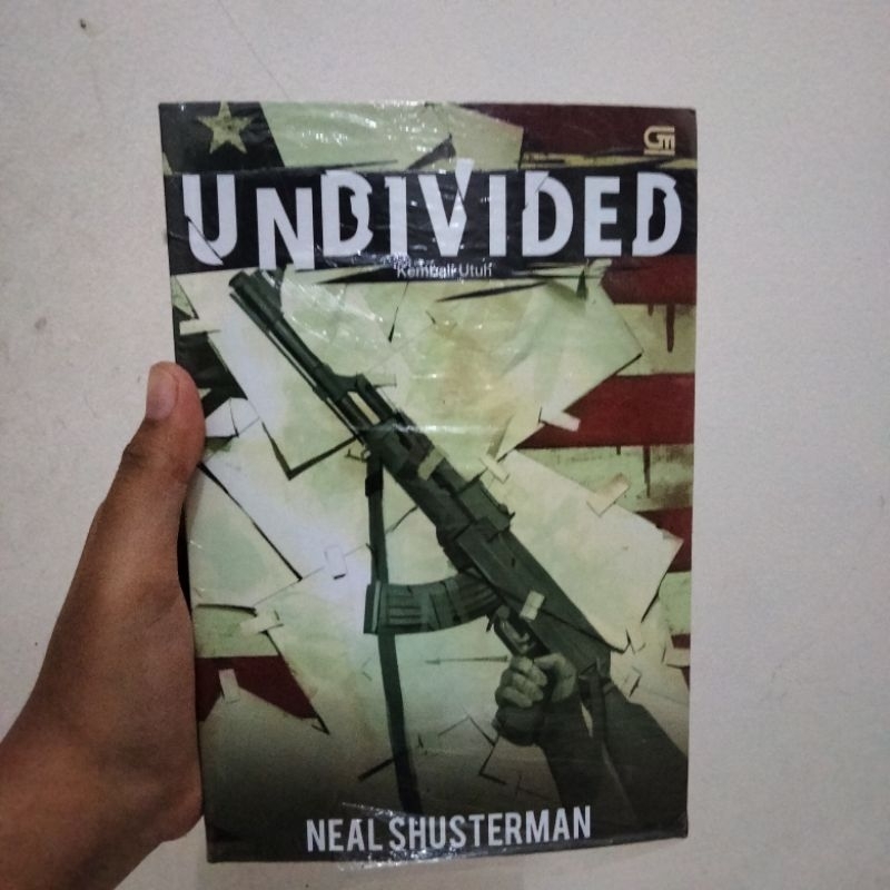 Undivided by. Neal Shusterman (terjemahan)