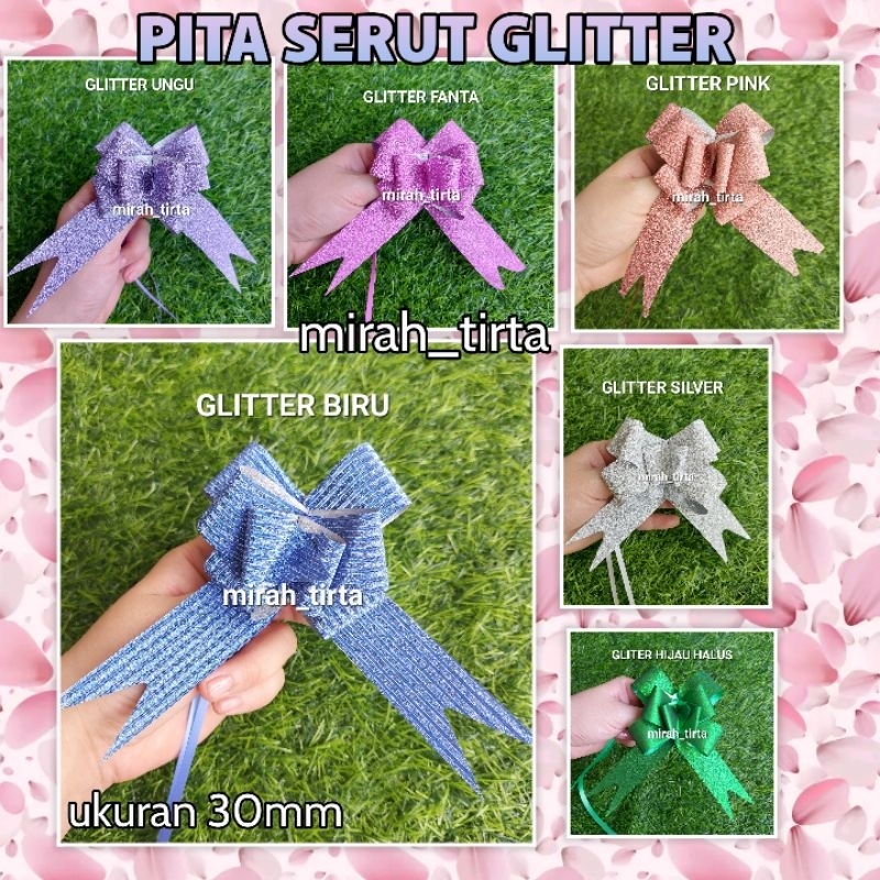 

PITA SERUT GLITTER 30MM. pita serut 3 cm glitter. Pita tarik glitter. pita buket bunga. pita parcel.puta goodiebag