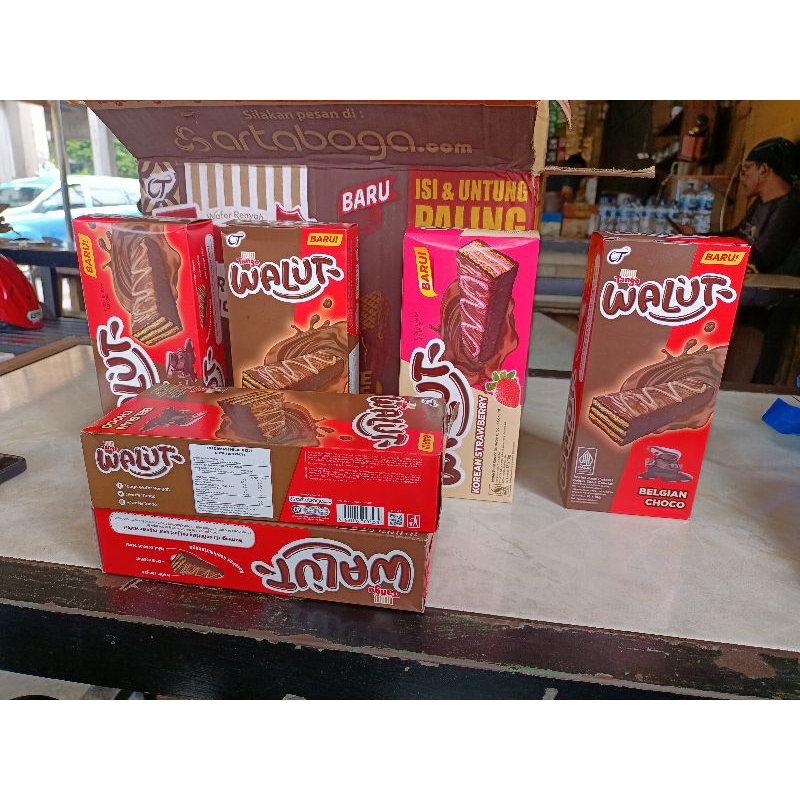 

Wafer Tango Walut Belgian Choco 15GR - [1 Box Isi 12 Pcs]