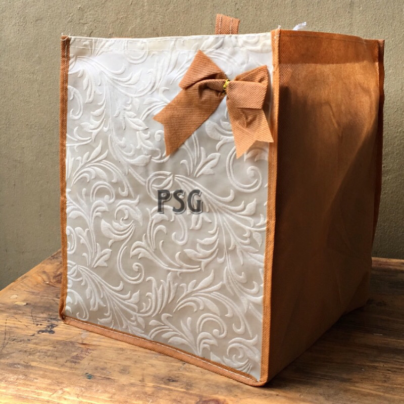 

iDk90 TAS PITA EMBOS 22x22 SPUNBOND (1lusin isi 12pcs)