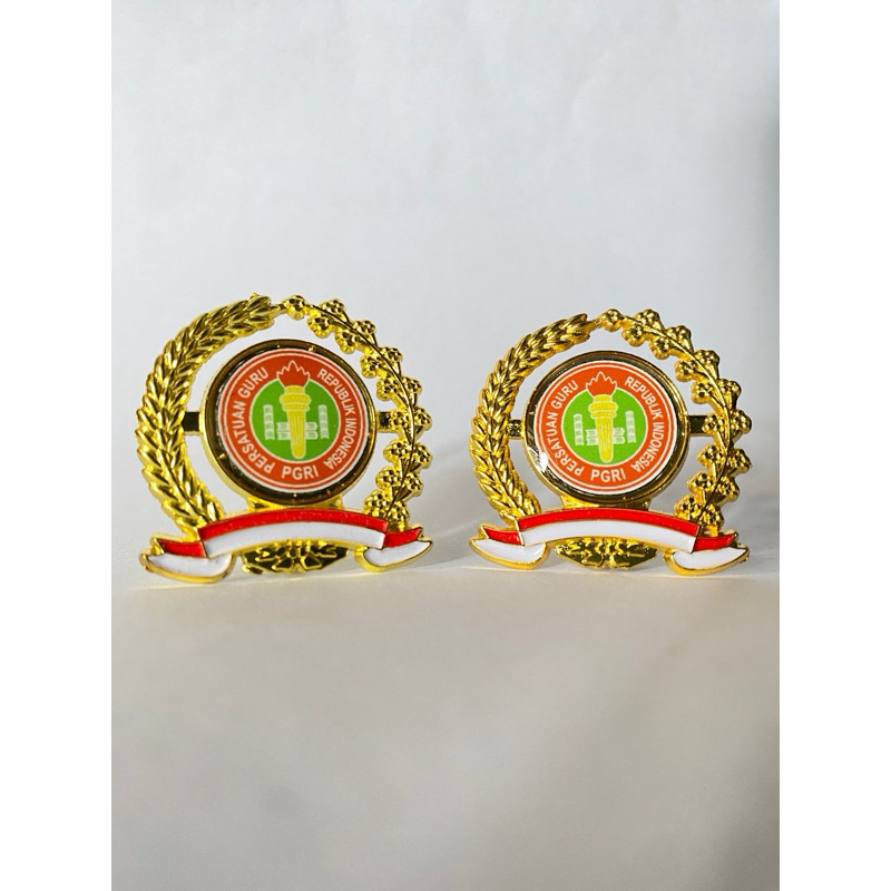 Pin/Bros PGRI logo terbaru