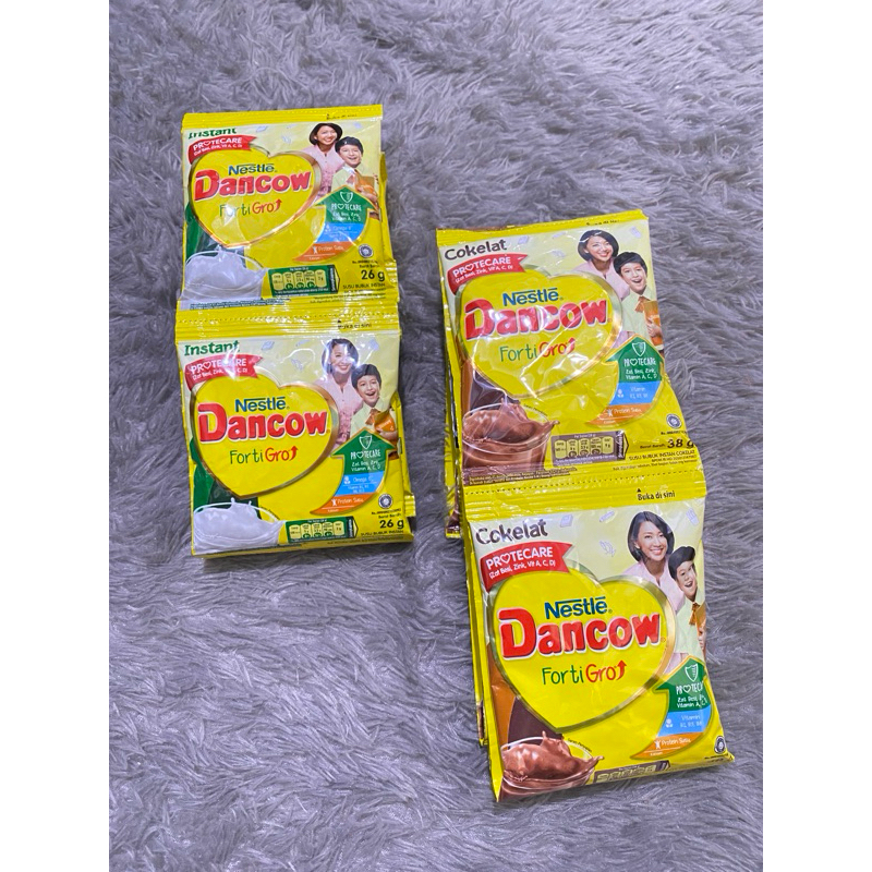 

susu bubuk dancow putih dan coklat 26gr 10pcs