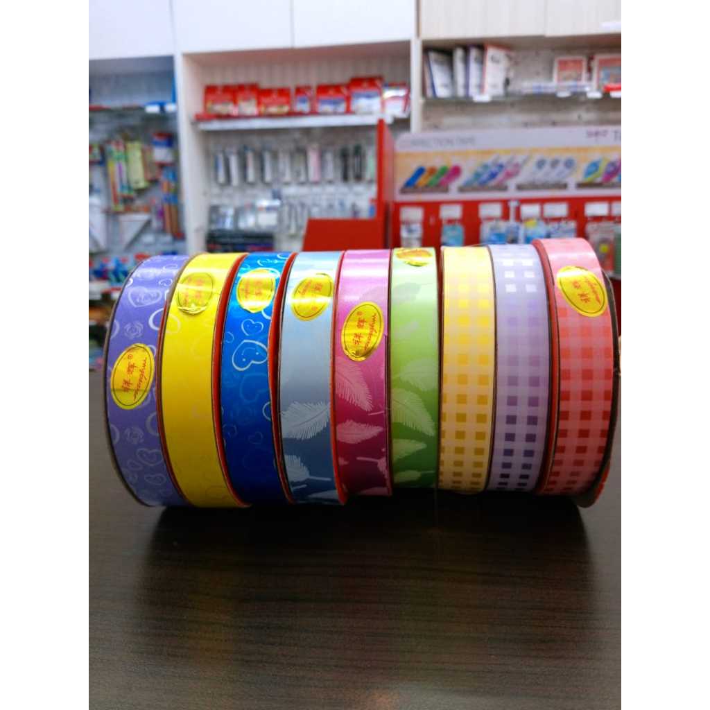 

Pita jepang /Pita kertas kado/ Pita plastik Motif per roll.