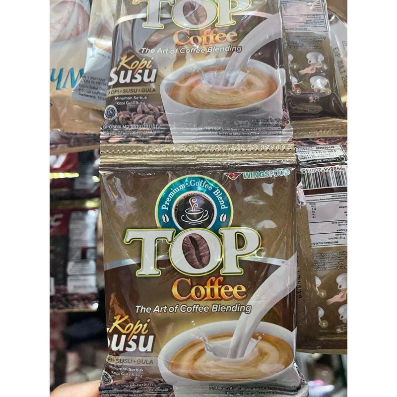 

Top coffe Kopi susu + gula 31gram x 10pcs / Top kopi susu / Top kopi susu gula sachet