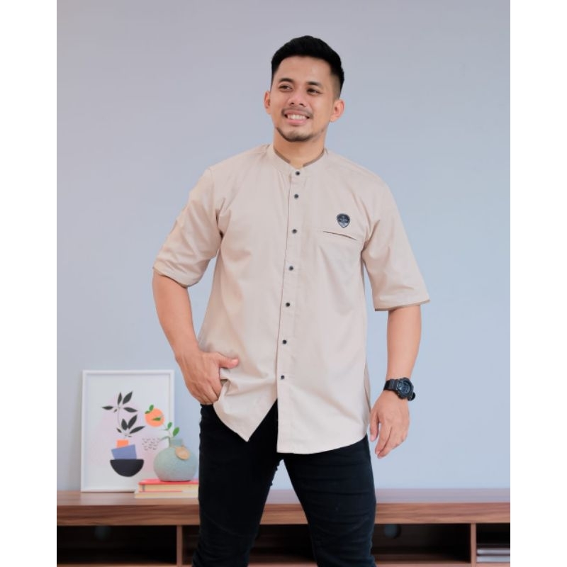 Koko ilnaaf lengan pendek