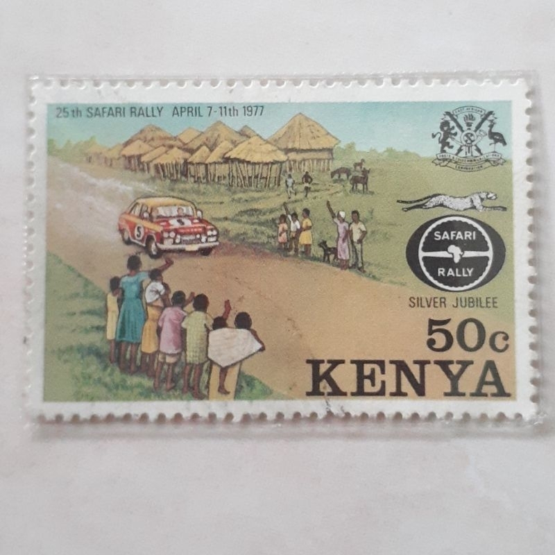 

Perangko Kenya 25 years Safari Rally (Automobile passing through village) Tahun 1977