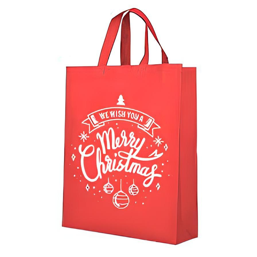 

Goodiebag Natal Spoundbond 30x40x10 Gratis Custom Nama dan Desain plus perekat/souvenir Natalan